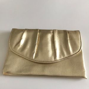 Adorable gold clutch